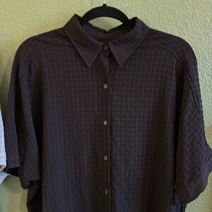 TWO oversized, casual camp shirts in sage green and black.